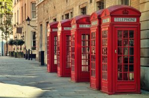 a group of five red phone booths in London