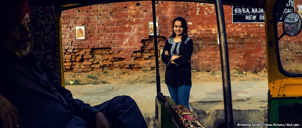 a woman standing smiling