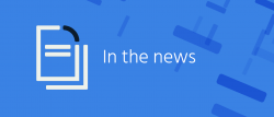 the text "in the news" on a blue background