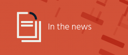 the text "in the news" on an orange background