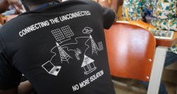 "Connecting the unconnected" on a delegate's t-shirt.