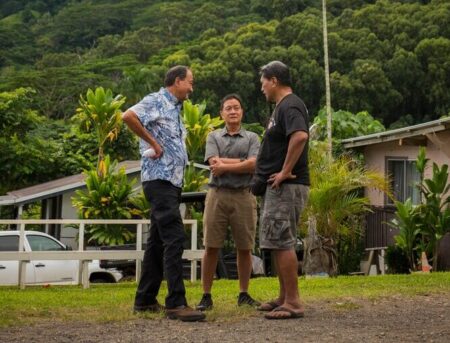 Three men talking Waimanalo Internet