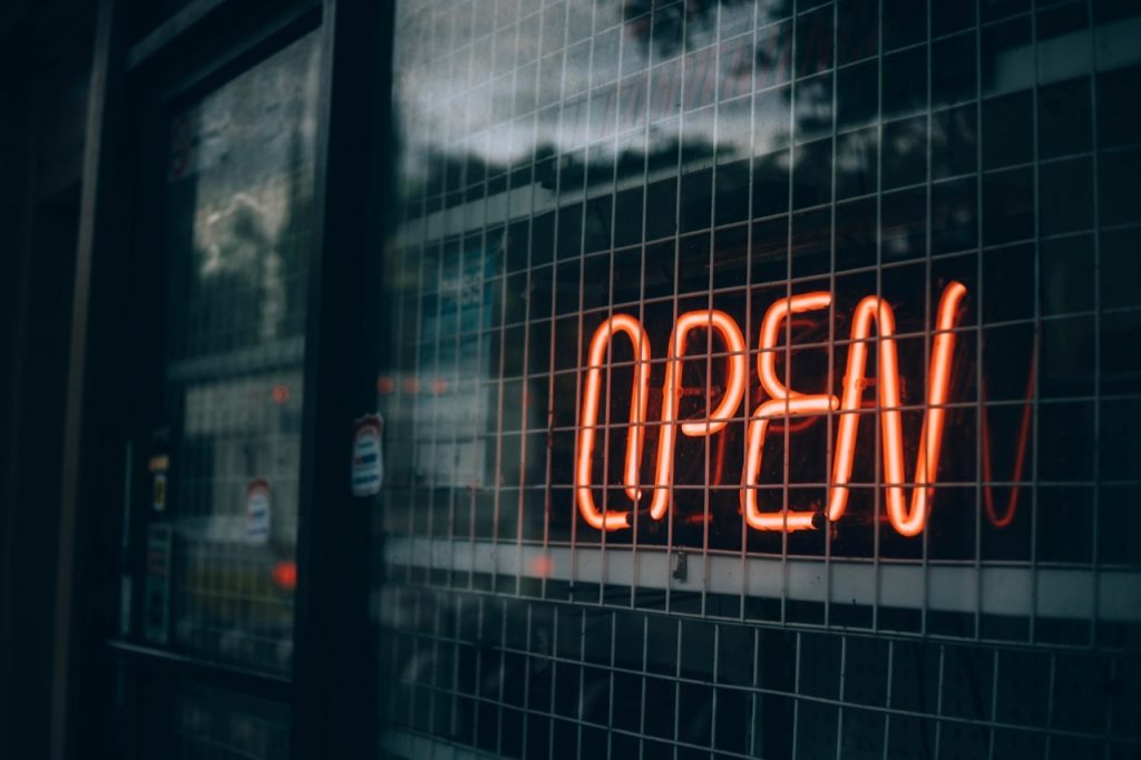 neon open sign on dark background