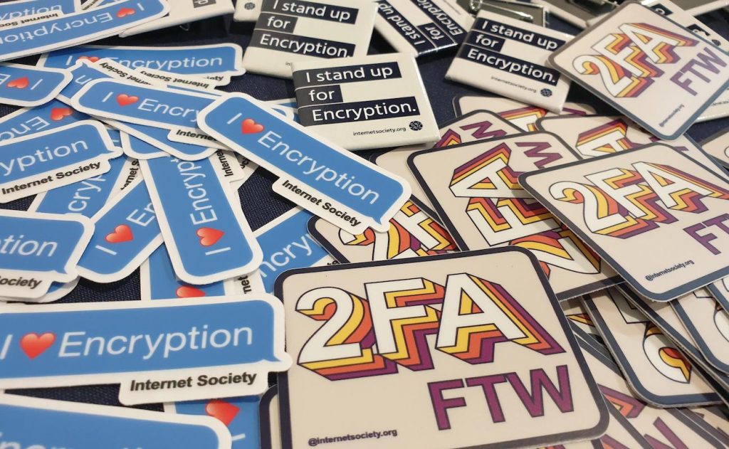 A lot of stickers on the table referring to encryption