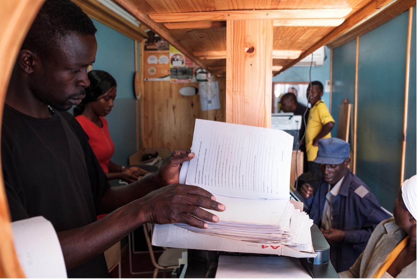 A man looking at papers 