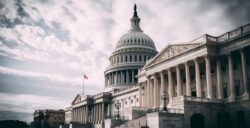 US capitol building with a cloudy sky