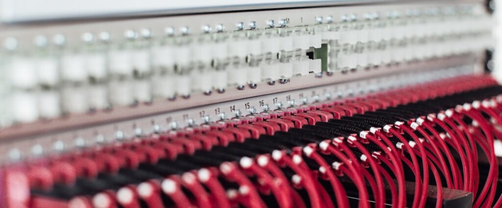 red cables entering the router