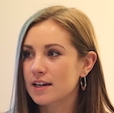 a headshot of a woman speaking