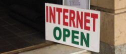 Sign outside of a business that reads 'Internet open'