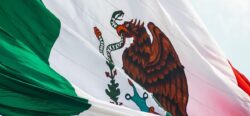 Photo of the Mexican flag blowing in the wind