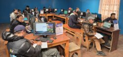 A group of Sherpas in Khunde and Khumjung taking an Internet training course