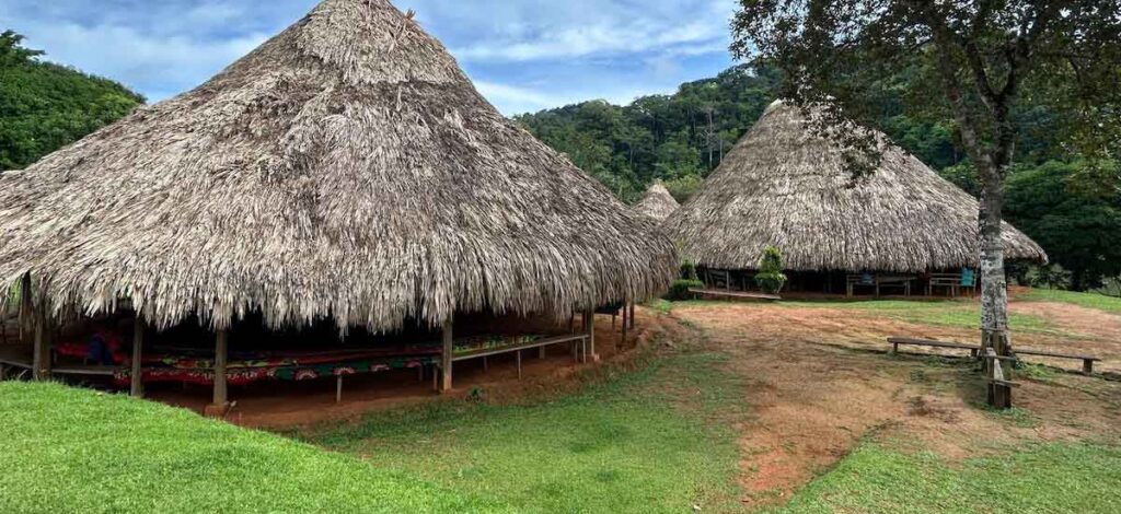 The outside of two buildings at an Embera community in Panama