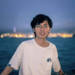 a headshot of Wang Qi 