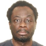 A man in dark grey shirt