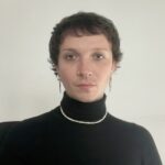 A man in black turtle neck