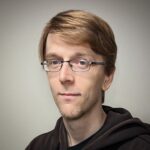 A man in black hoodie