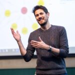 A man gesticulating with his hands