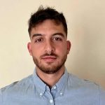 A man in a blue shirt