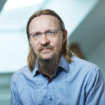 A man in a blue shirt