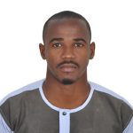 A man wearing a grey shirt