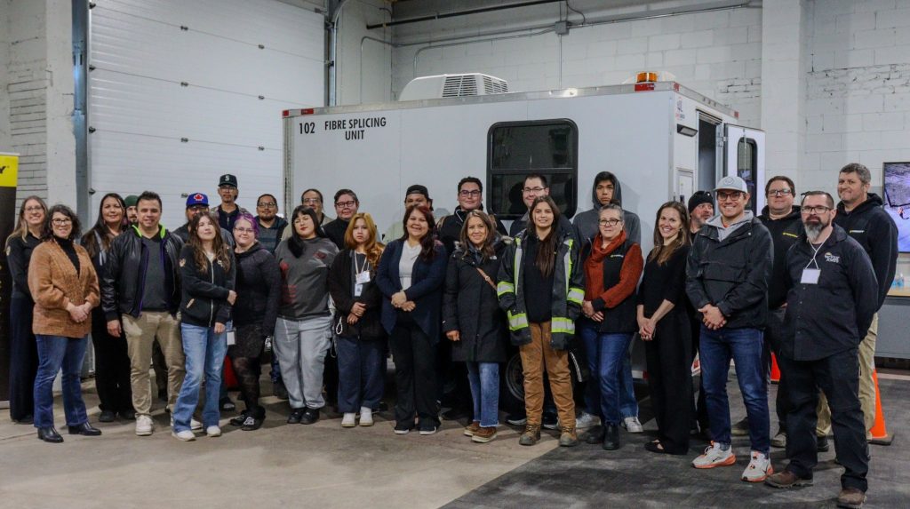 Group photo of people in industrial facility