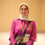 A woman wearing a colorful headscarf