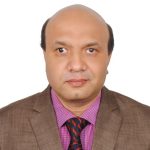 A man in a formal suit and tie